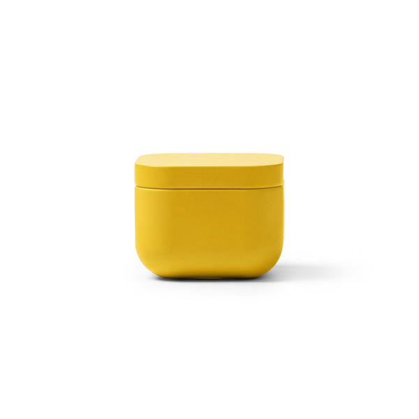 Trini - La vela aromática viene en un elegante recipiente metálico cuadrado - Amarillo