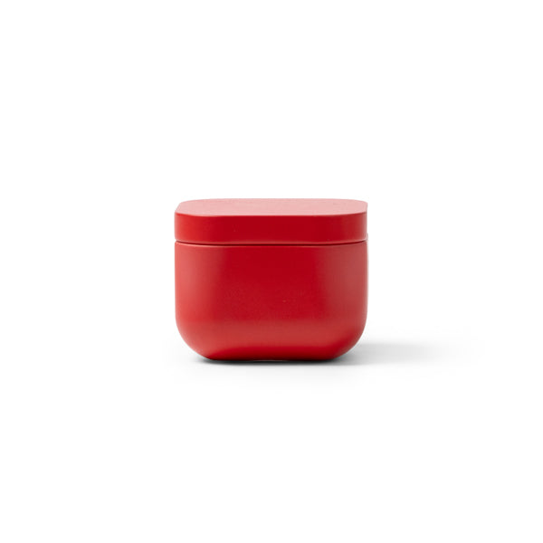 Trini - La vela aromática viene en un elegante recipiente metálico cuadrado - Rojo