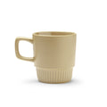 Longi - Taza de cerámica con base con diseño biselado - Beige
